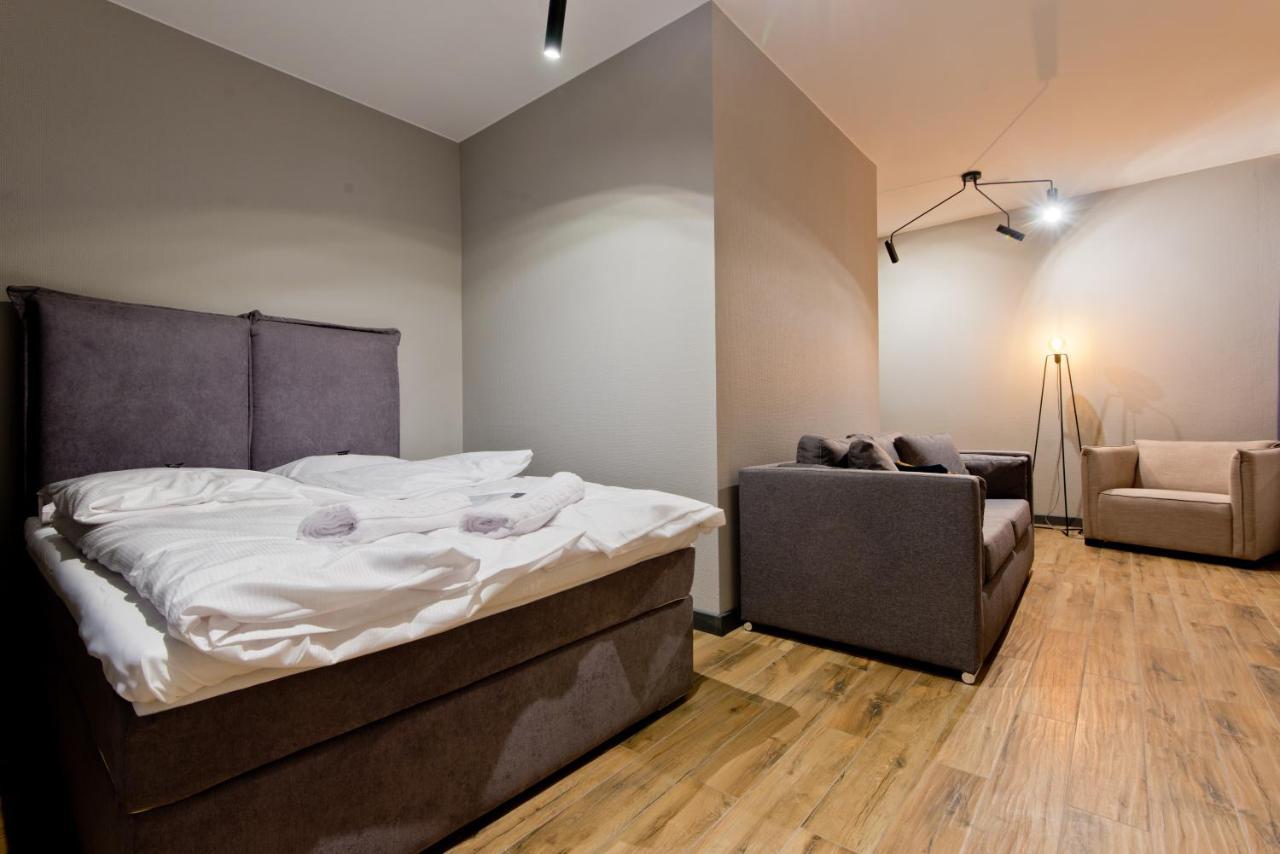 Apartsuites I Sorau ジャリ エクステリア 写真 A bedroom with a sofa bed